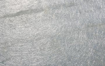 Lawers laminate fibreglass or shingles?